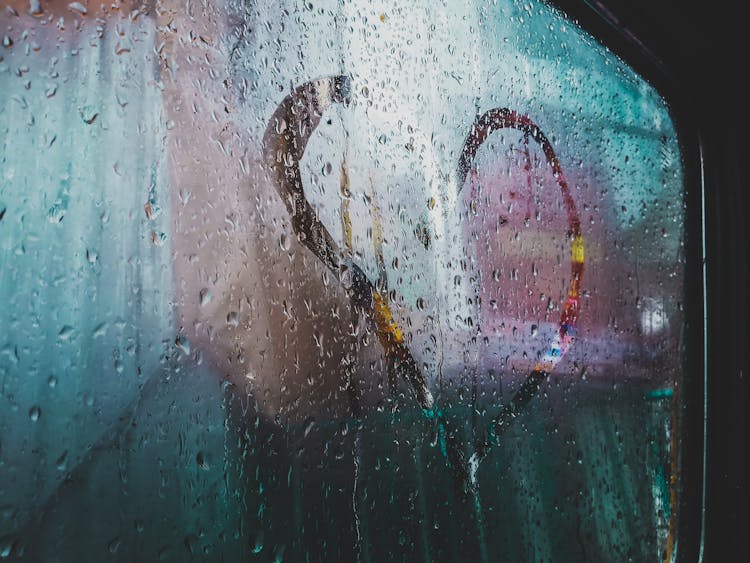 Heart On Bus Glass With Water Drops At Night