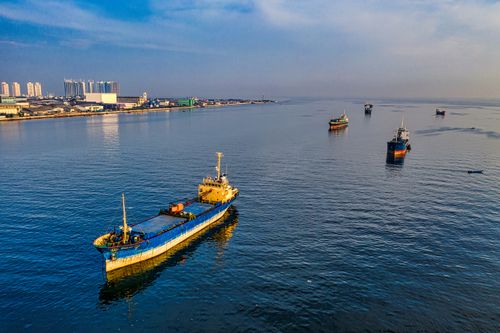 Free Aerial view of container ships in the ocean near Jakarta, Indonesia. Stock Photo