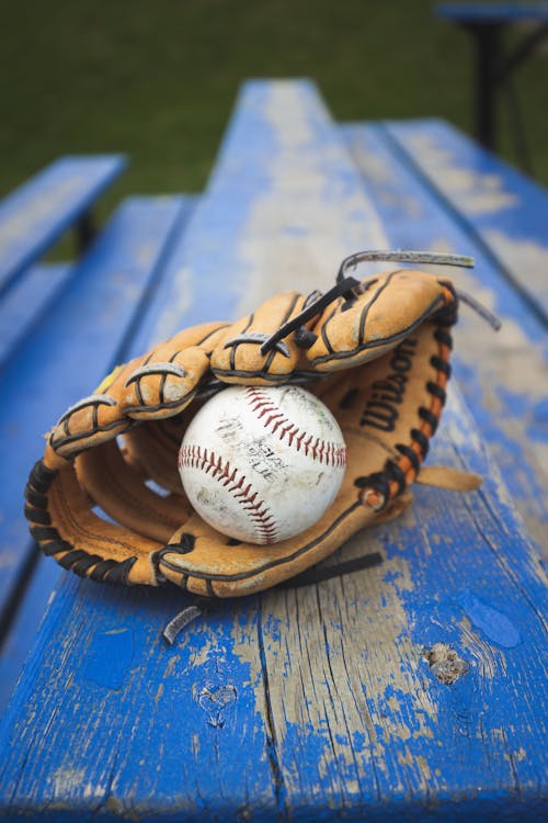 Close-Up Shot of Baseball and Baseball Glove