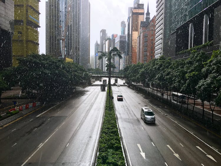 Cars Driving On A Slippery Asphalt Road