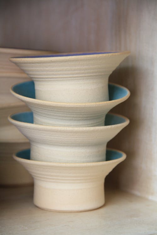 A Stack of Handmade Clay Containers 
