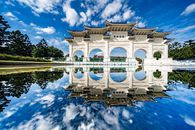 White oriental memorial archway in sunny day