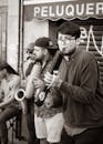 Man in Black Jacket Playing Wind Instrument