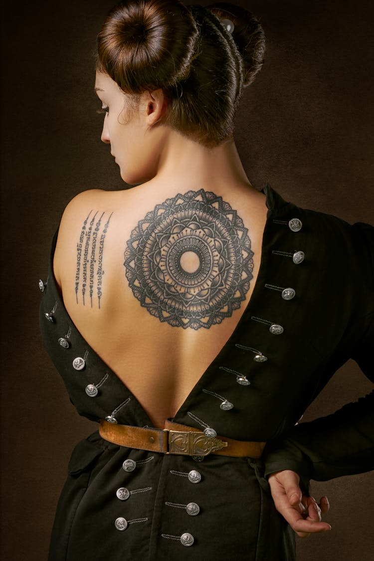 Woman With Back Tattoo