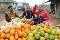 People Standing Near Fruit Stand