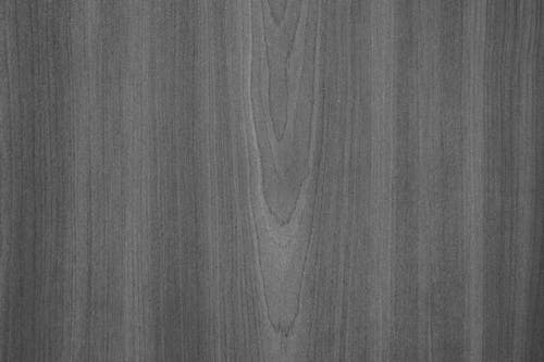 Grayscale Photo of Wooden Surface