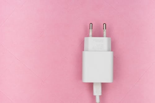 Free Mobile  Adapter on Pink Surface Stock Photo
