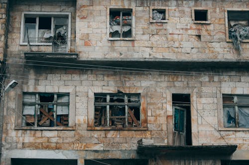 Free Exterior of an Abandoned Building Stock Photo