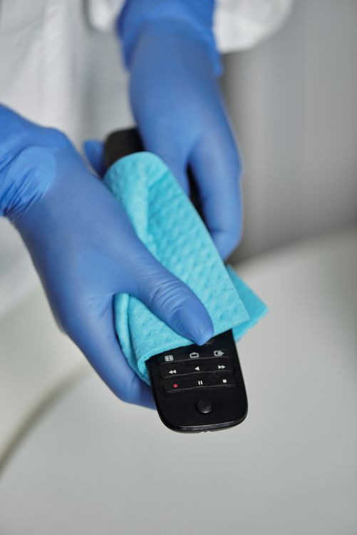 persons holding a red and black remote controllers ·... A Person Holding Black Remote Control · Free Stock Photo