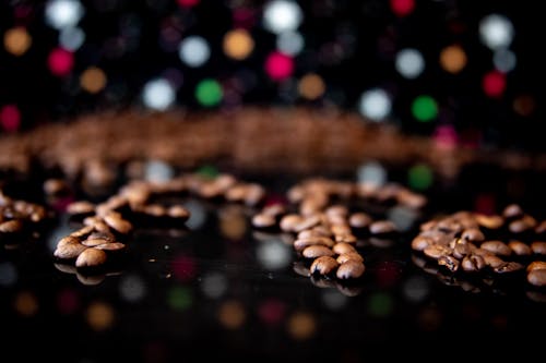 Blurred Shot of Coffee Beans on a Black Surface