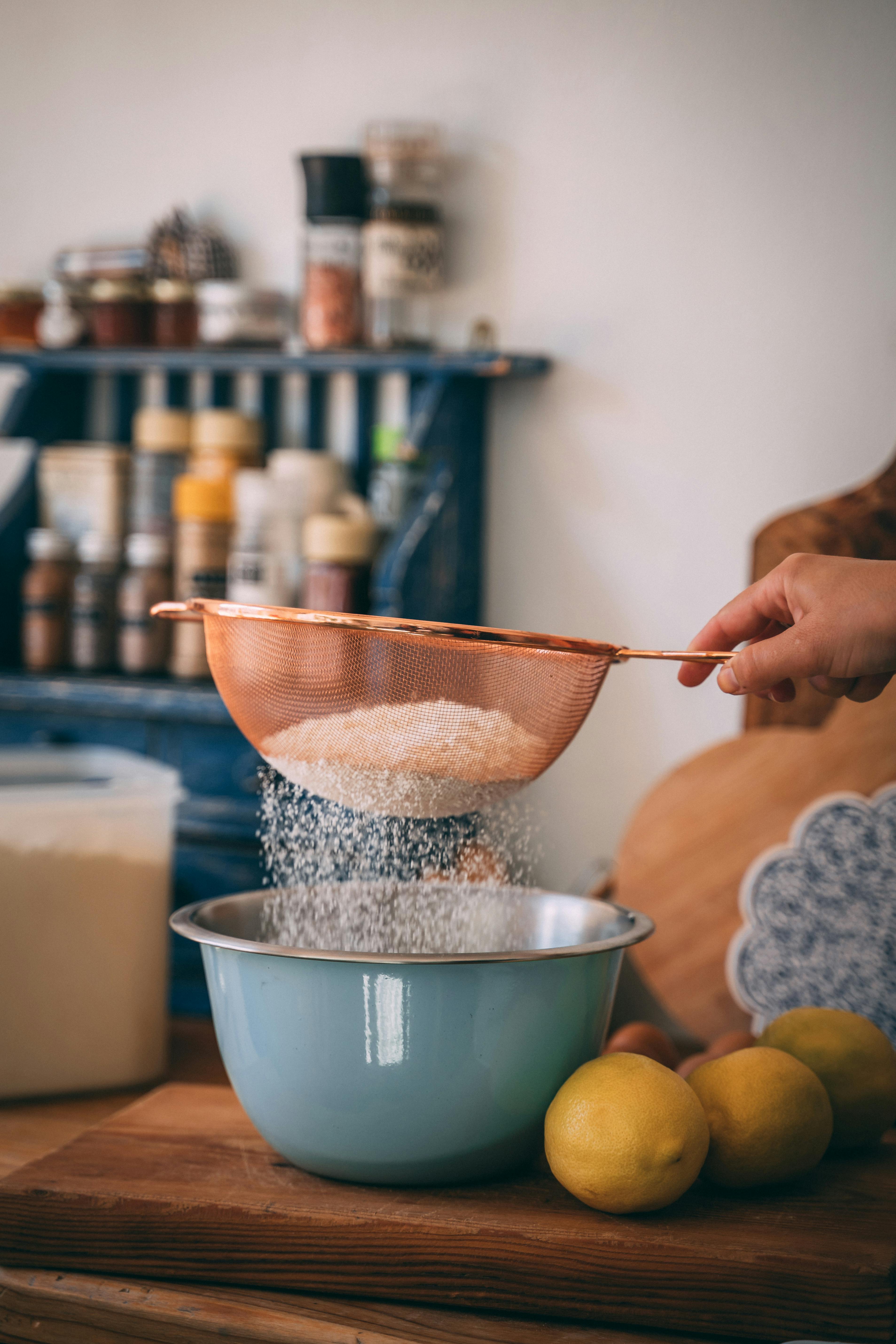 A Person Sifting the Flour · Free Stock Photo