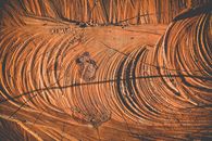 Tracks from vehicles in dry hot desert