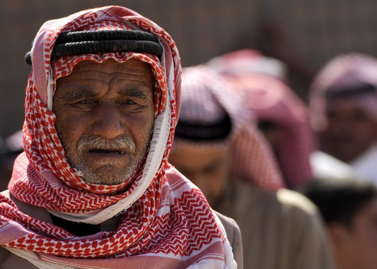 Man Wearing Red White Keffiyeh