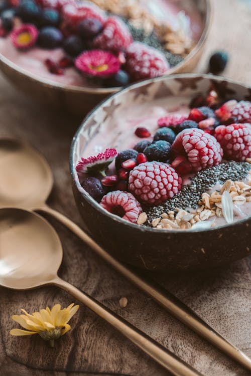 Close Up of Breakfast Bowls with Fruits and Grains