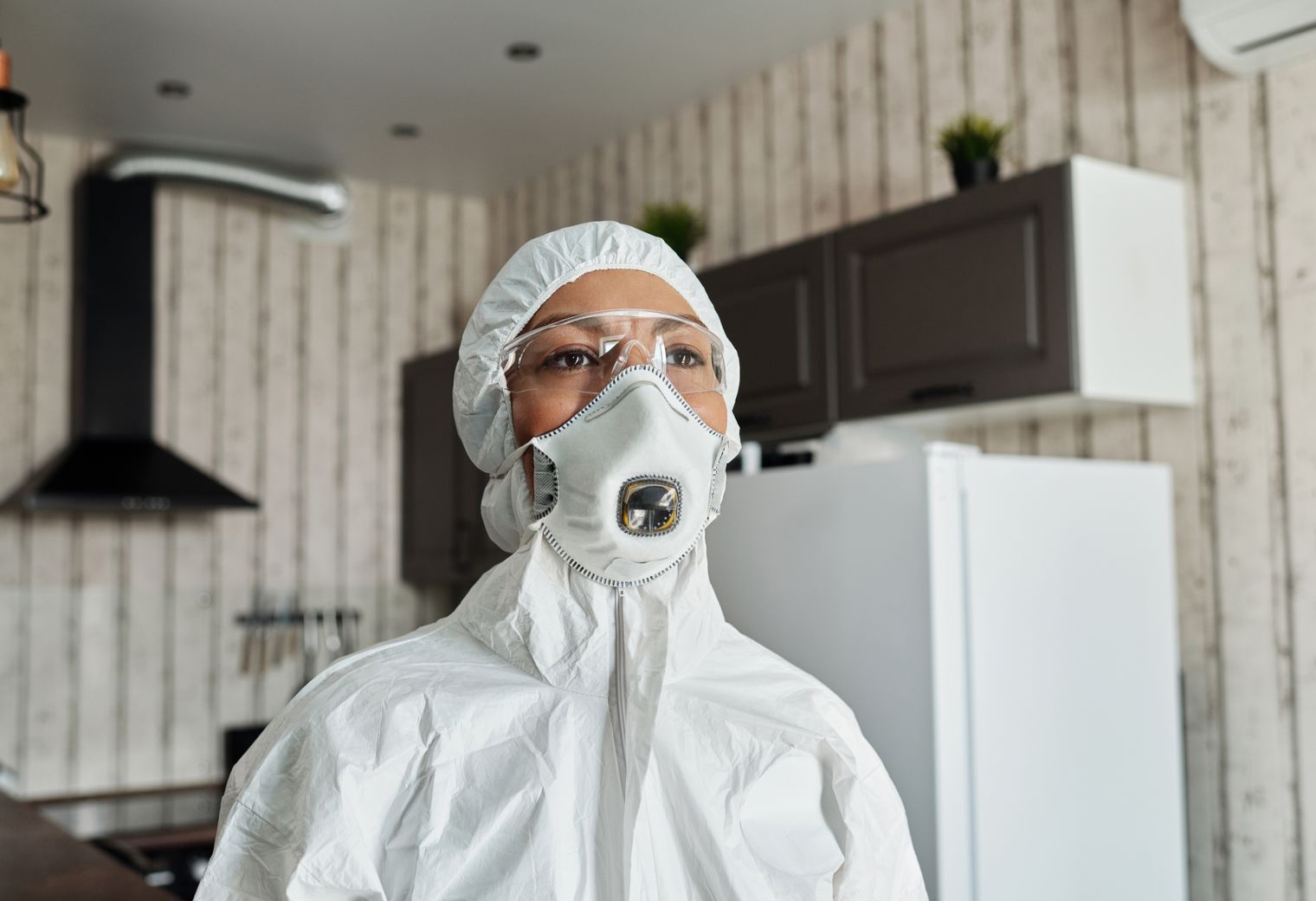 Masonry and Render Painting in Tooting Bec — dust sheets down and the room fully protected