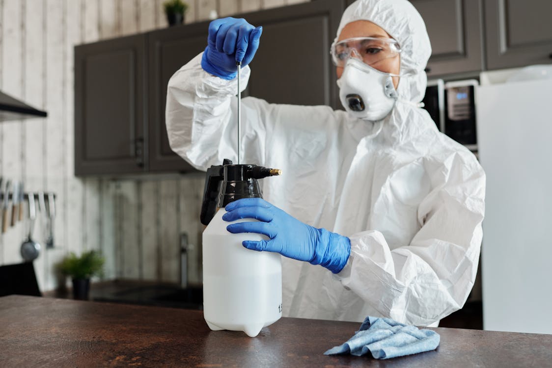 a person making a cleaning agent