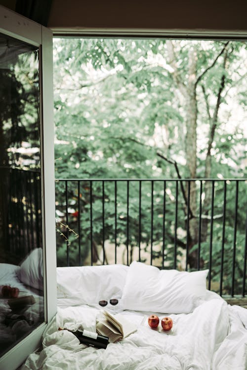 Free White Bed On The Balcony Stock Photo