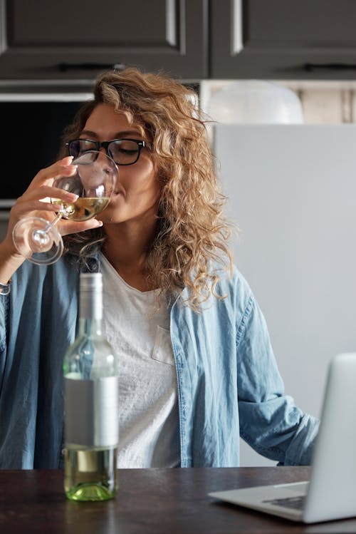 Photo Of Woman Drinking Alcoholic Beverage