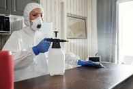 Photo Of Person Spraying Disinfectant