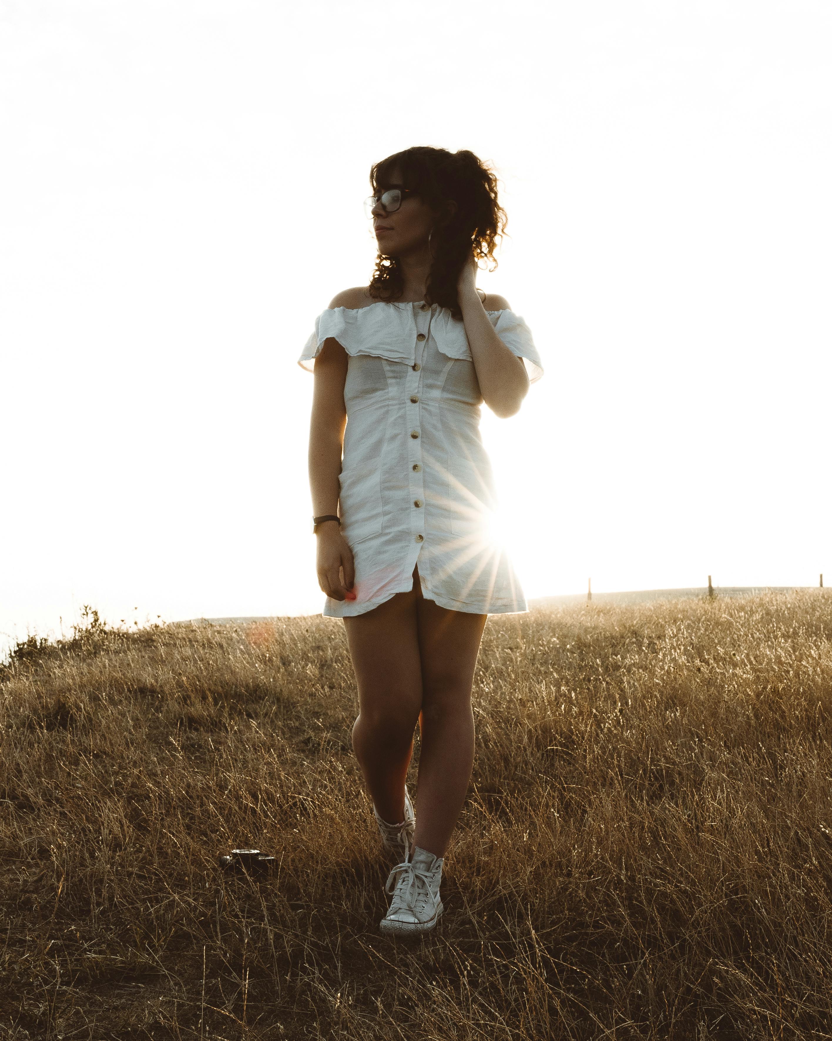 Photo of Woman Wearing White Dress Standing Near Abandoned Building ...