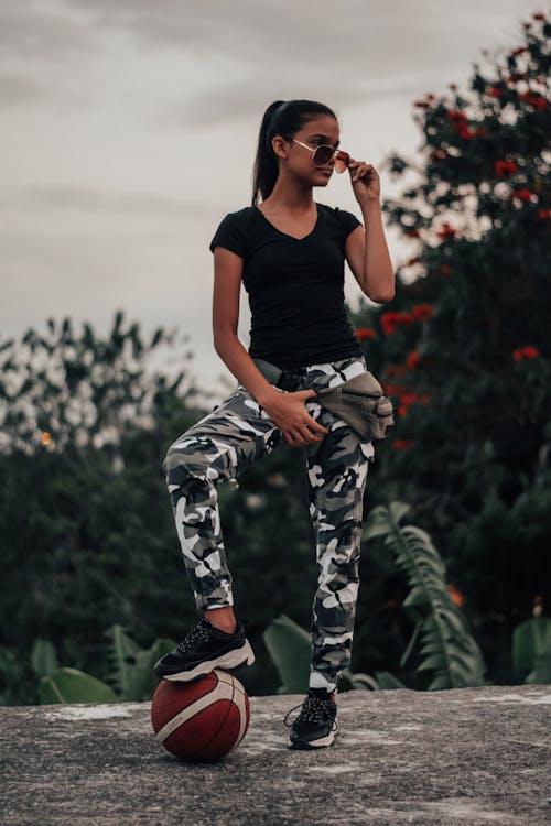 Photo Of Woman Wearing Camouflage Pants