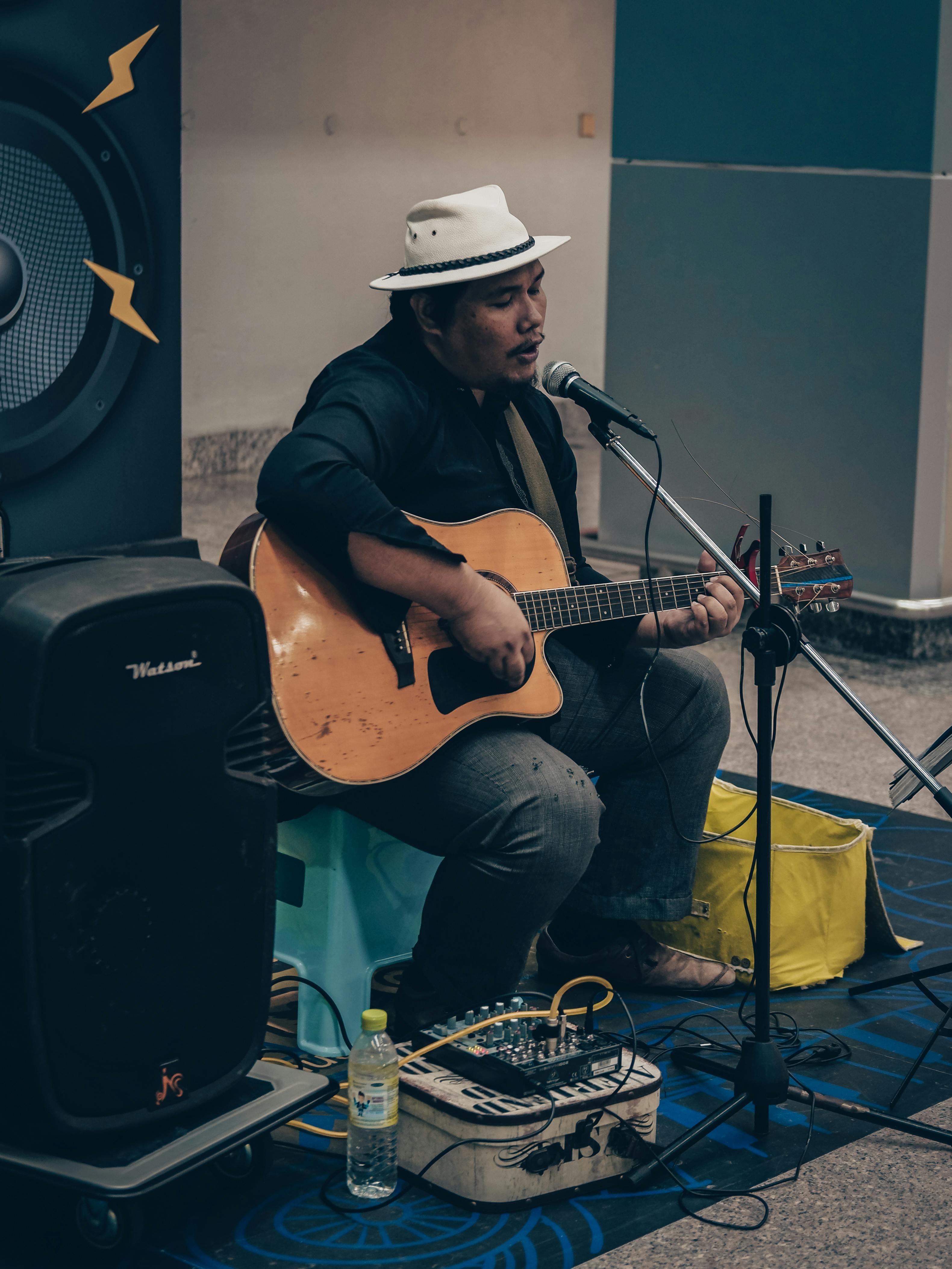 acoustic guitar player on stage