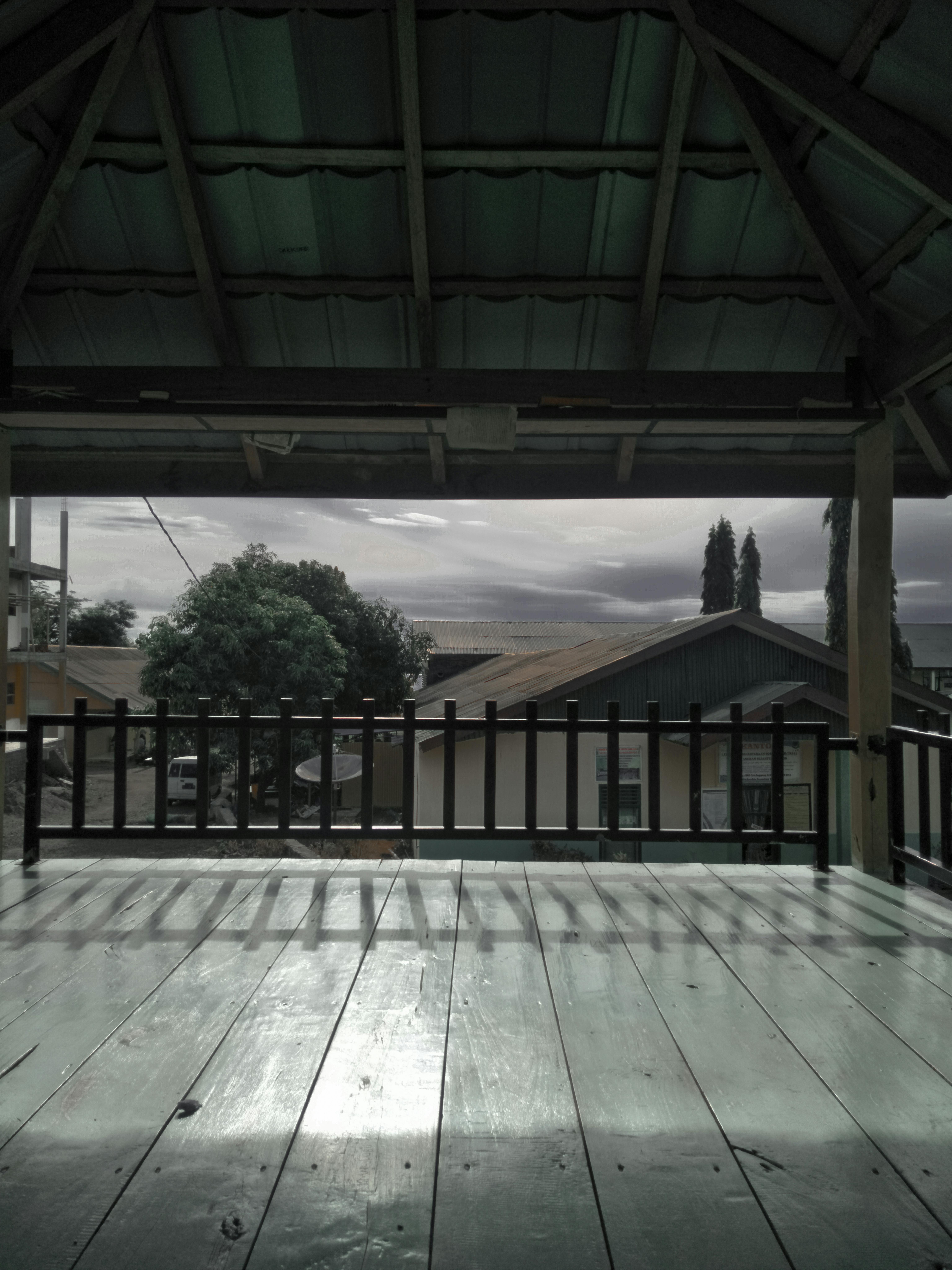 Lawyer or executive reviewing documents at a desk with a laptop