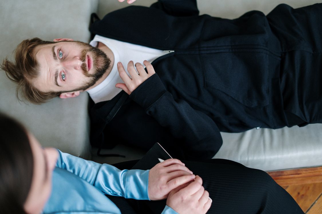 Two chairs in a warm, welcoming therapy room — what a first therapy session setting looks like