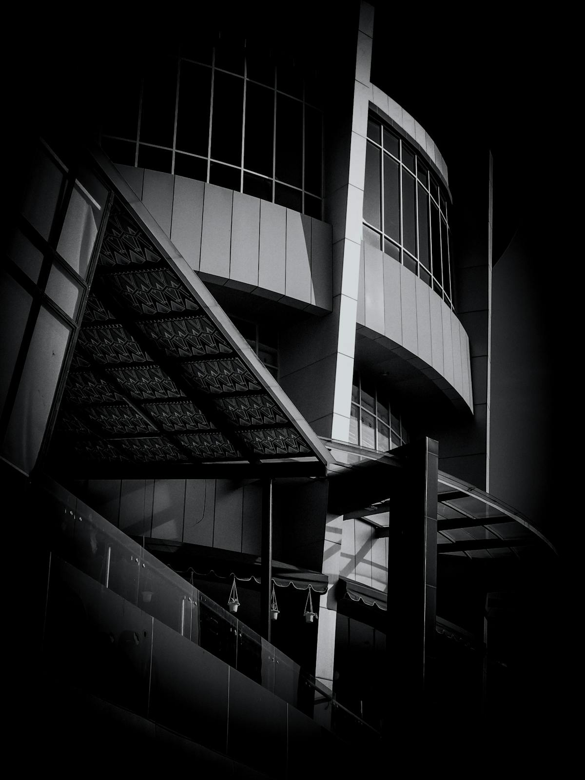 A bowl of hearty lentil and vegetable stew garnished with herbs on a rustic table