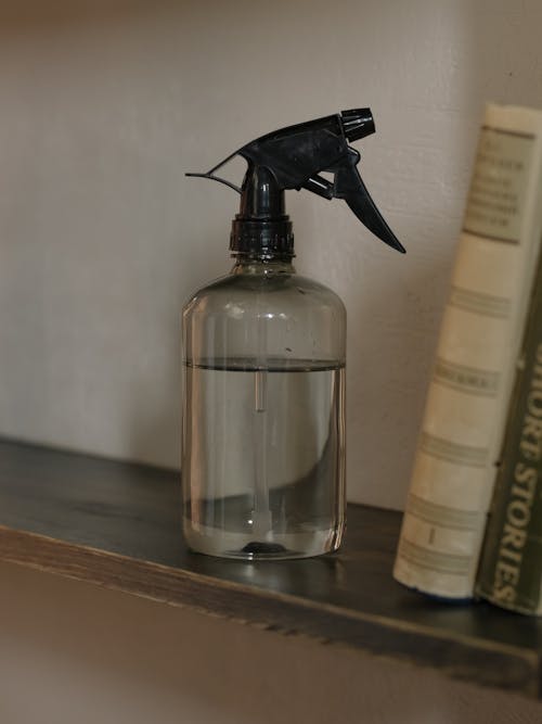 Close-up Photo of Clear Spray Bottle 
