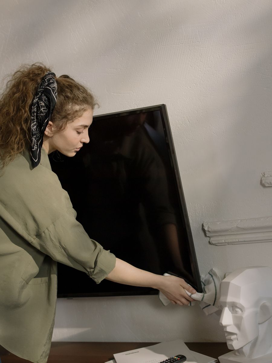 Person putting on cleaning gloves