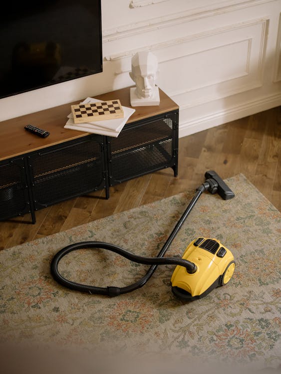 Free Yellow and Black Vacuum Cleaner Stock Photo