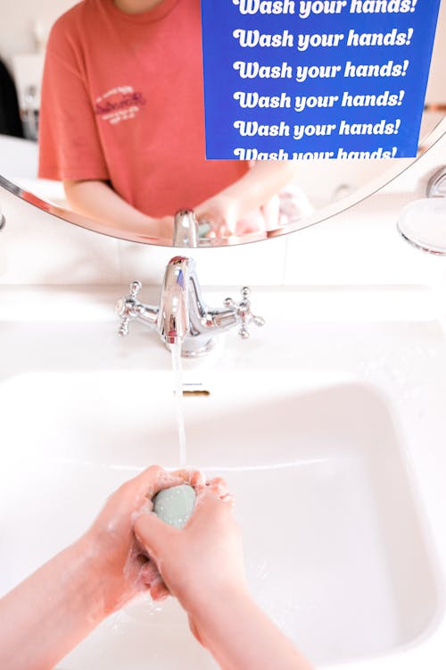 Person Washing Hands