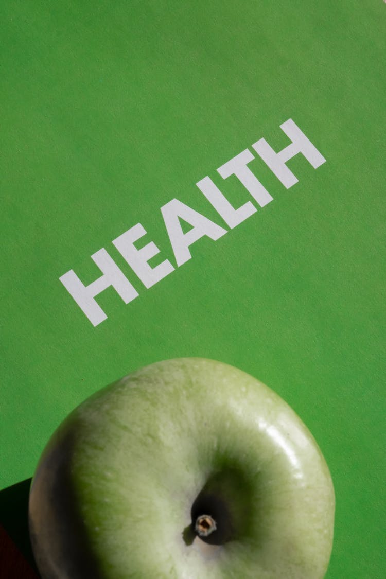 Health Text Over Apple