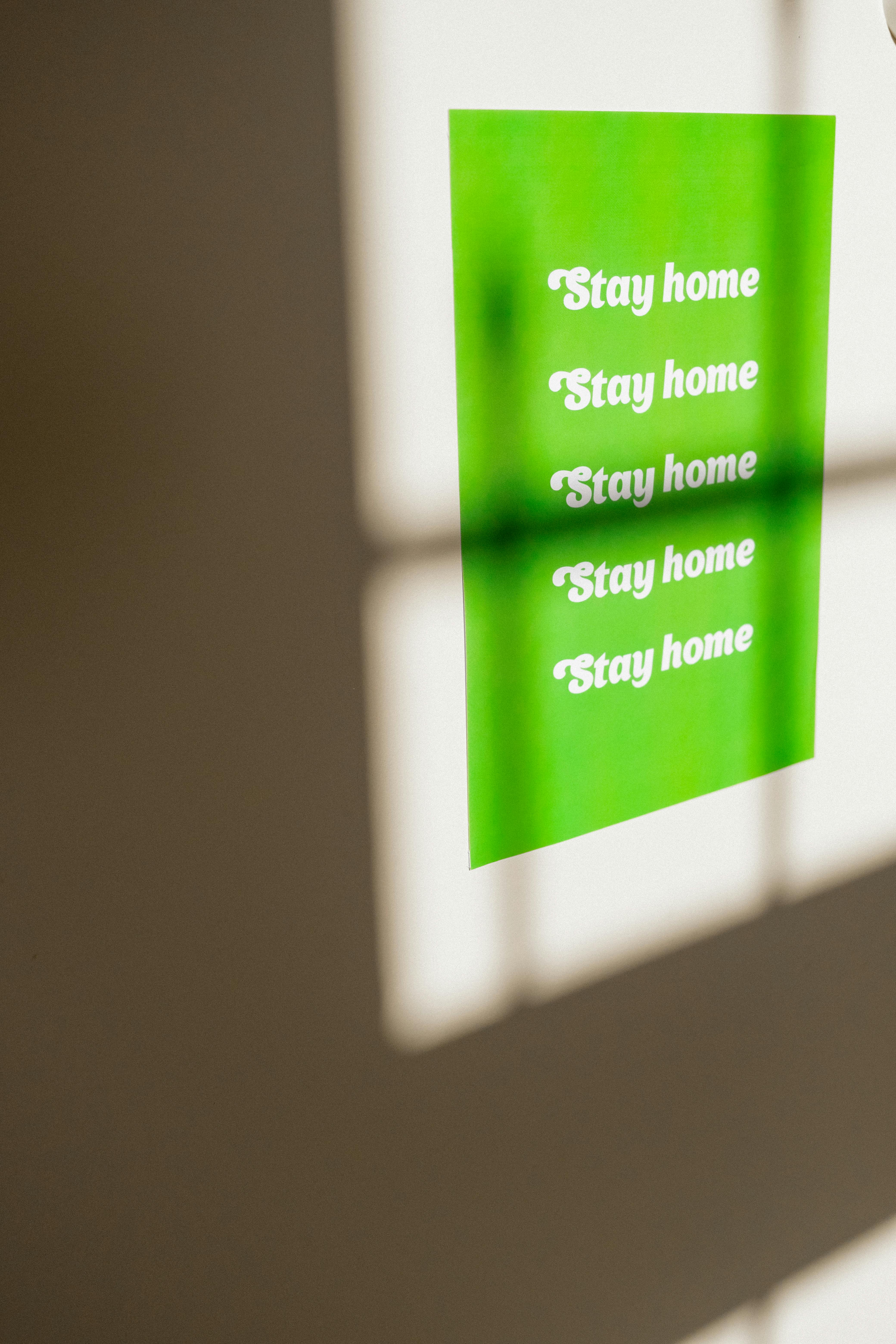 stay home text on wall