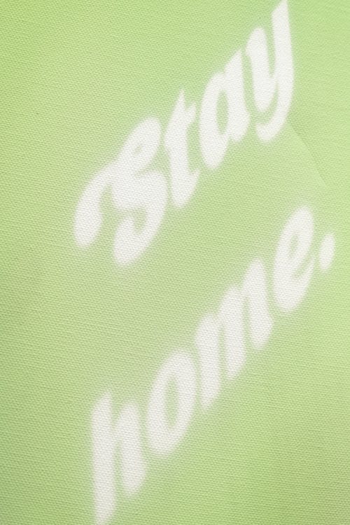 Stay Home Text on Green Background 