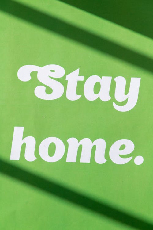 Stay Home Text on Green Background 