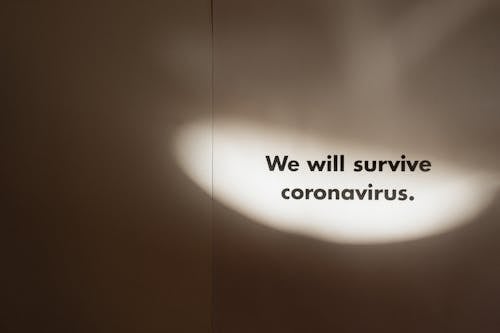 Grayscale Photo Of Slogan On Coronavirus