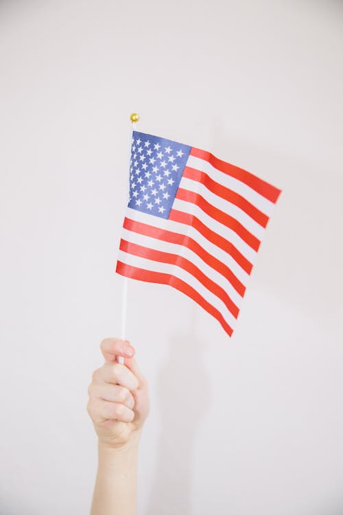 American Flag held by a Person 