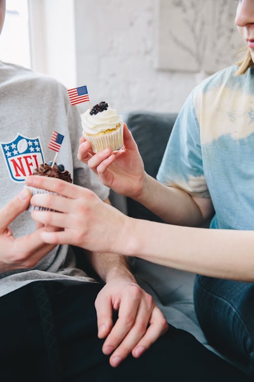 People with Cupcakes with Flags of USA