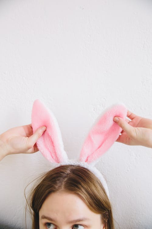 Free Person With Bunny Ears Stock Photo