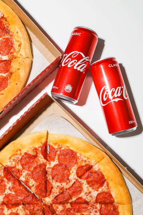 Free Red Coca Cola Cans Beside Pizza Stock Photo