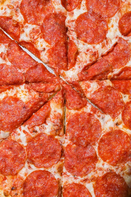 Sliced Pepperoni Pizza In Close-up View