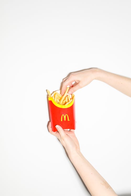 Free Person Getting Fries Stock Photo