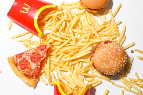 Безкоштовне стокове фото на тему «mcdonalds, бургер, картопля фрі»