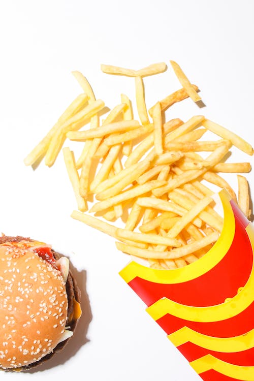 French Fries and Burger on White Background