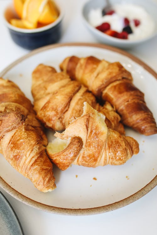 Free Croissant Bread On a White Plate  Stock Photo