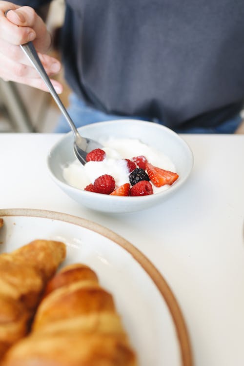 Close Up Shot of Berries and Yogurt in the Bowl