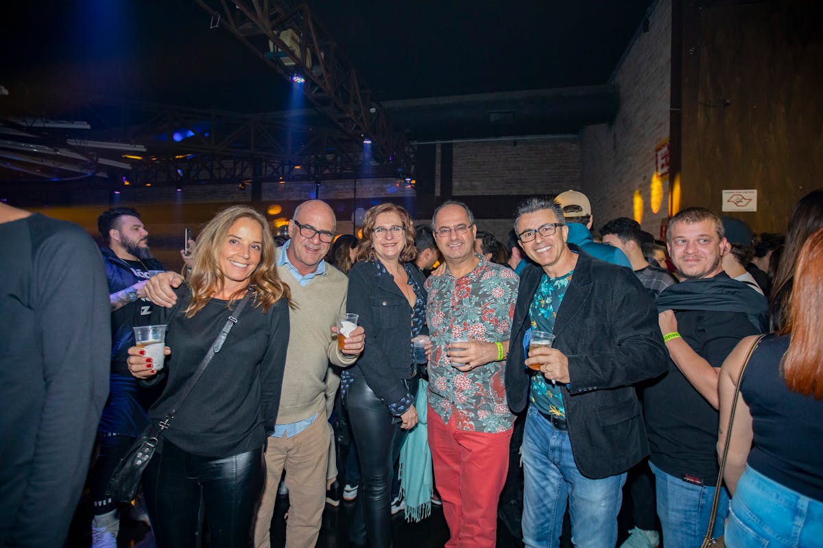 Mediterranean table setting with salads, bread, olives, and shared dishes