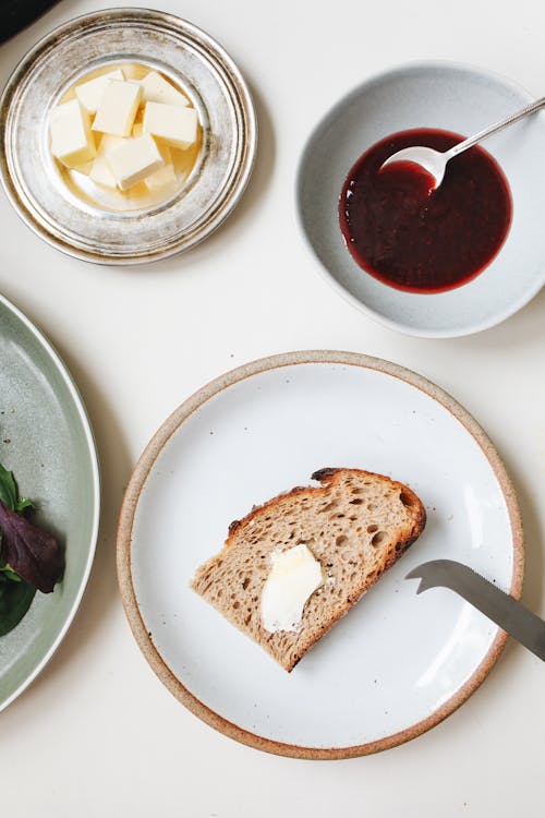 Free Flatlay Photo of Bread on the Plate Stock Photo